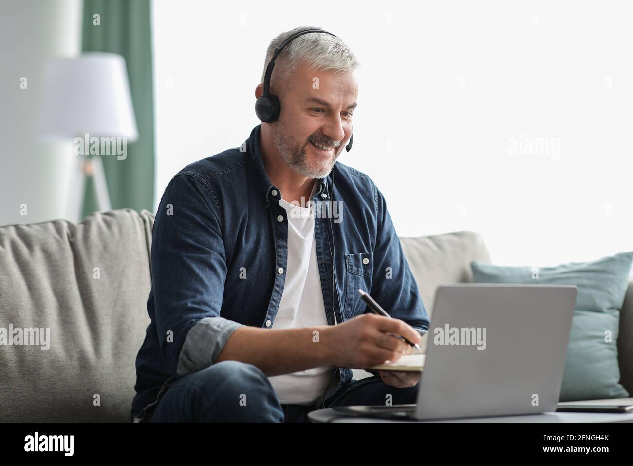 Bearded mature man using hi-res stock photography and images - Alamy