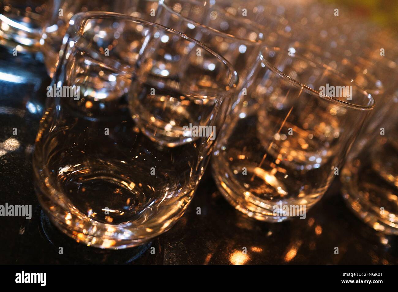 Sparkling drinks glasses in a row Stock Photo