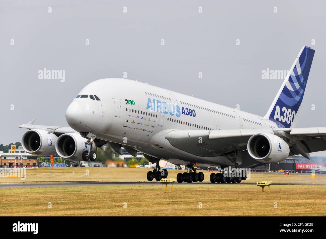 Airbus A380 corporate schemed jet airliner plane prototype F-WWDD landing after display flight at Farnborough International Airshow 2010, UK Stock Photo