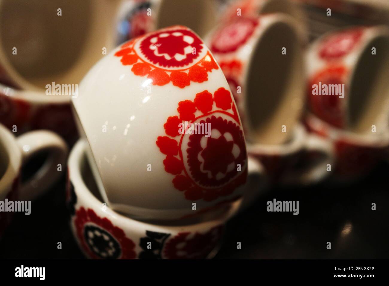 Kuwait City, Kuwait - May 5, 2021: Small Turkish coffee cups with orange floral design Stock Photo