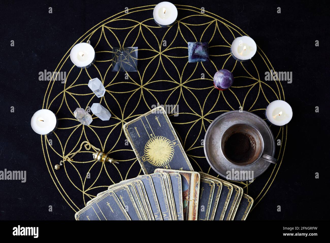 Fortune Telling Table with tarot cards and esoteric objects Stock Photo