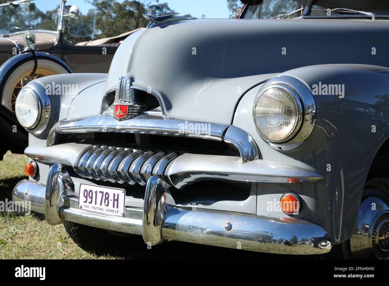 The front of a 1950s Holden Special (FJ), including lights, grill, badge, bumper and bonnet Stock Photo