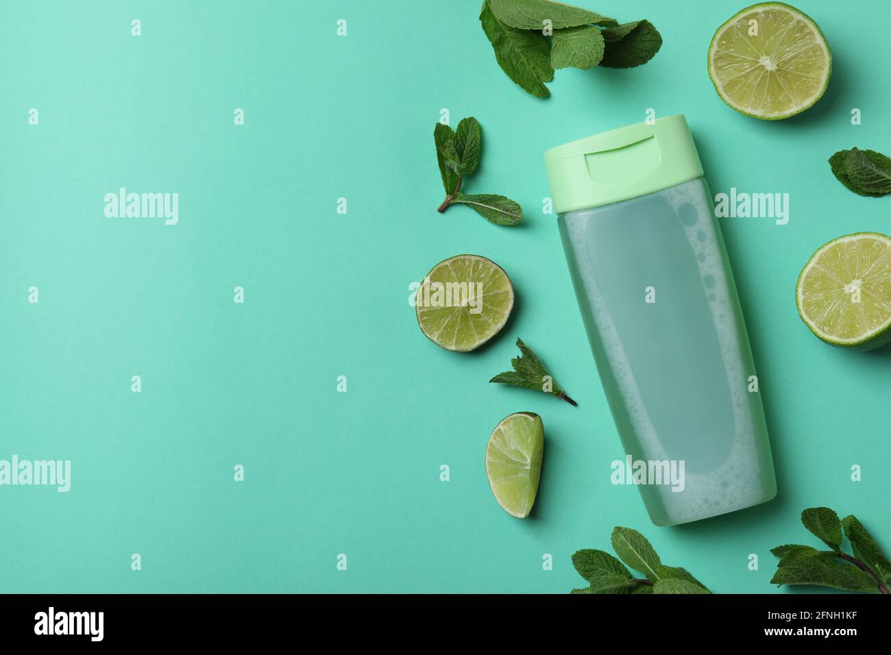 Shower gel and ingredients on mint background Stock Photo Alamy