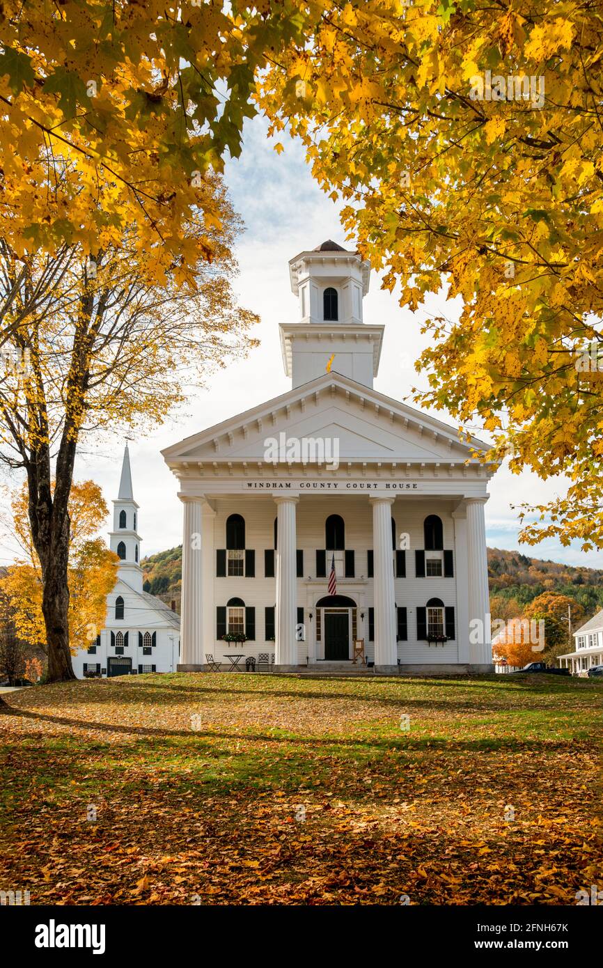 Autumn image of foliage in Newfane, Vermont of court house and church with bright color late in the afternoon. Stock Photo