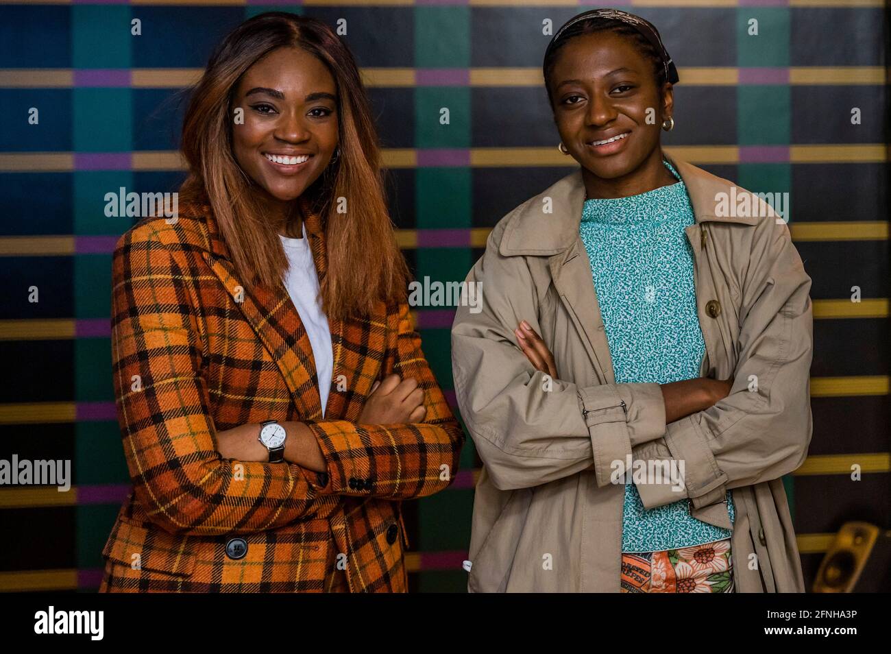 London, UK. 17th May, 2021. A Glittering City: Ayo Akingbade with Duchamp & Sons - two films by London-based artist Ayo Akingbade (pictured with her curator); a new Whitechapel Gallery commission, Fire in My Belly (2021), and Dear Babylon (2019). Whitechapel Gallery's new exhibitions as it re-opens after the latest lockdown - Timed entry will be in place with a one-way system around the gallery amongst other Coronavirus precautions. Credit: Guy Bell/Alamy Live News Stock Photo