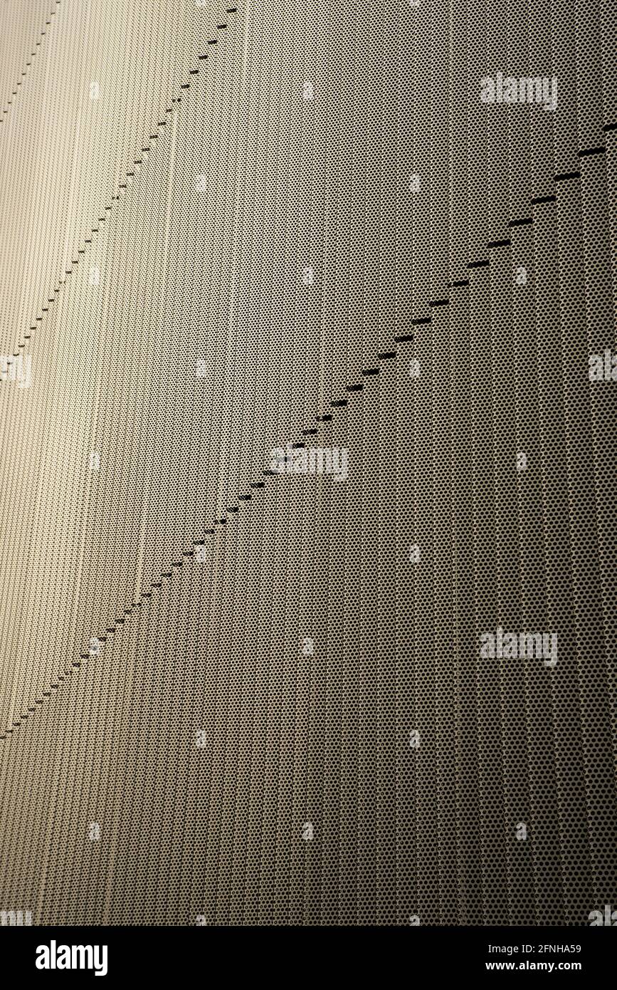 Perforated thick aluminium / aluminum cladding sheets bent sharply to