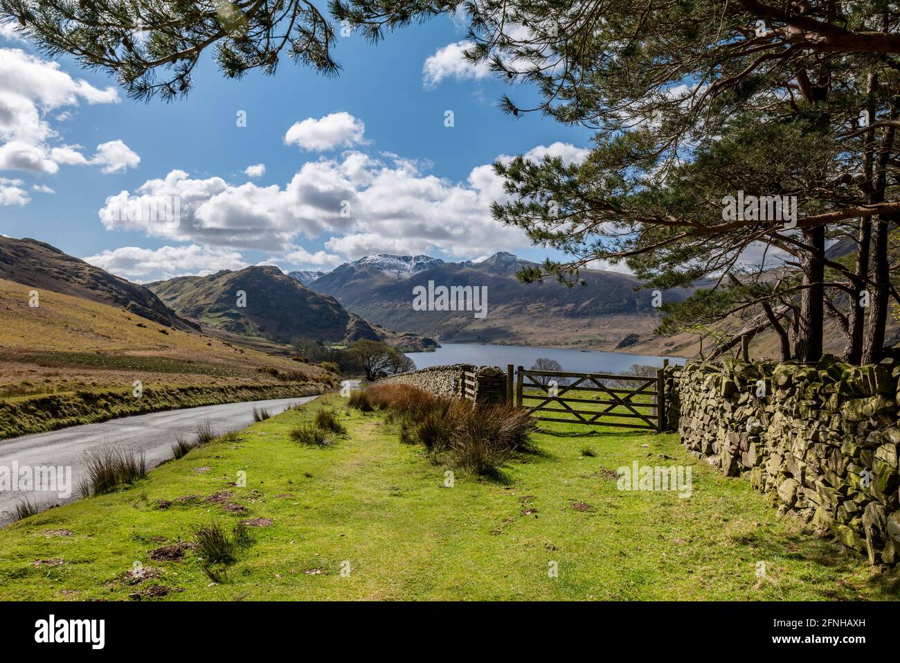 The road down to Crummock water on a beautiful spring morning, Lake District, Cumbria, UK. Stock Photo