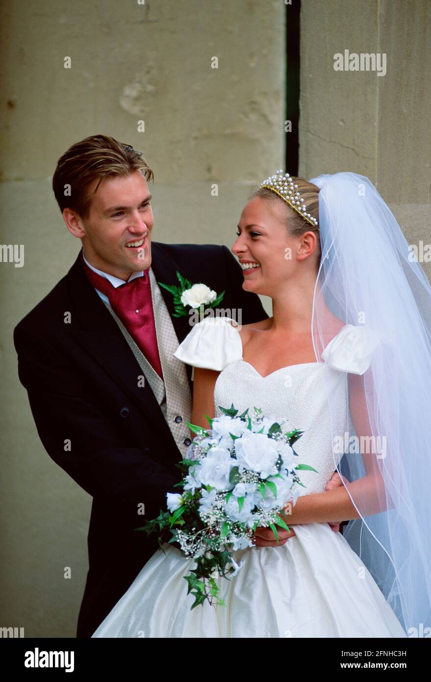 Bride and groom outside church hi-res stock photography and images - Alamy