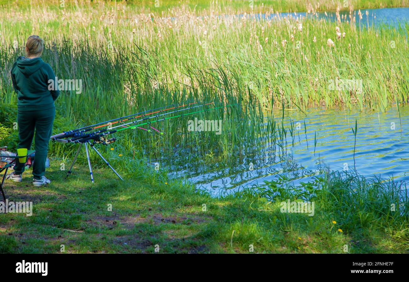 Girl holding fish fishing rod hi-res stock photography and images - Page 3  - Alamy