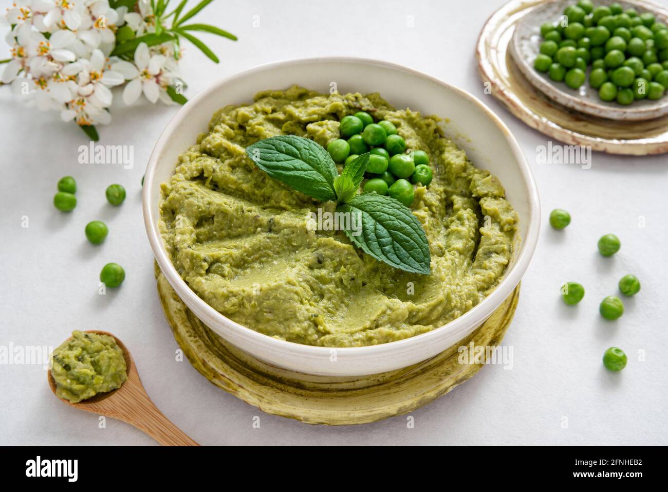Close-up of a plate of mashed peas Stock Photo