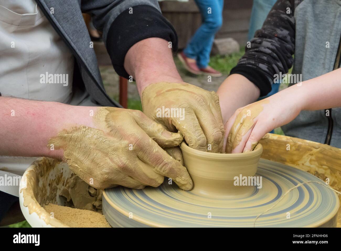 Potter moulding clay on pottery wheel stock photo (133011) - YouWorkForThem