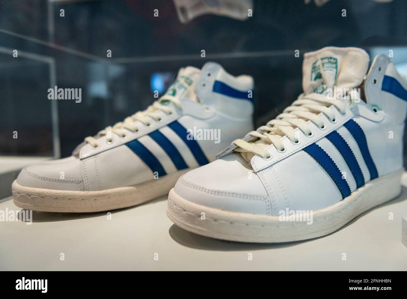London, UK. 17 May 2021. "Adidas Jabbar", 1980s, first released in 1977,  and worn by NBA legend Kareem Abdul Jabbar. Preview of “Sneakers Unboxed:  Studio to Street” at the Design Museum in
