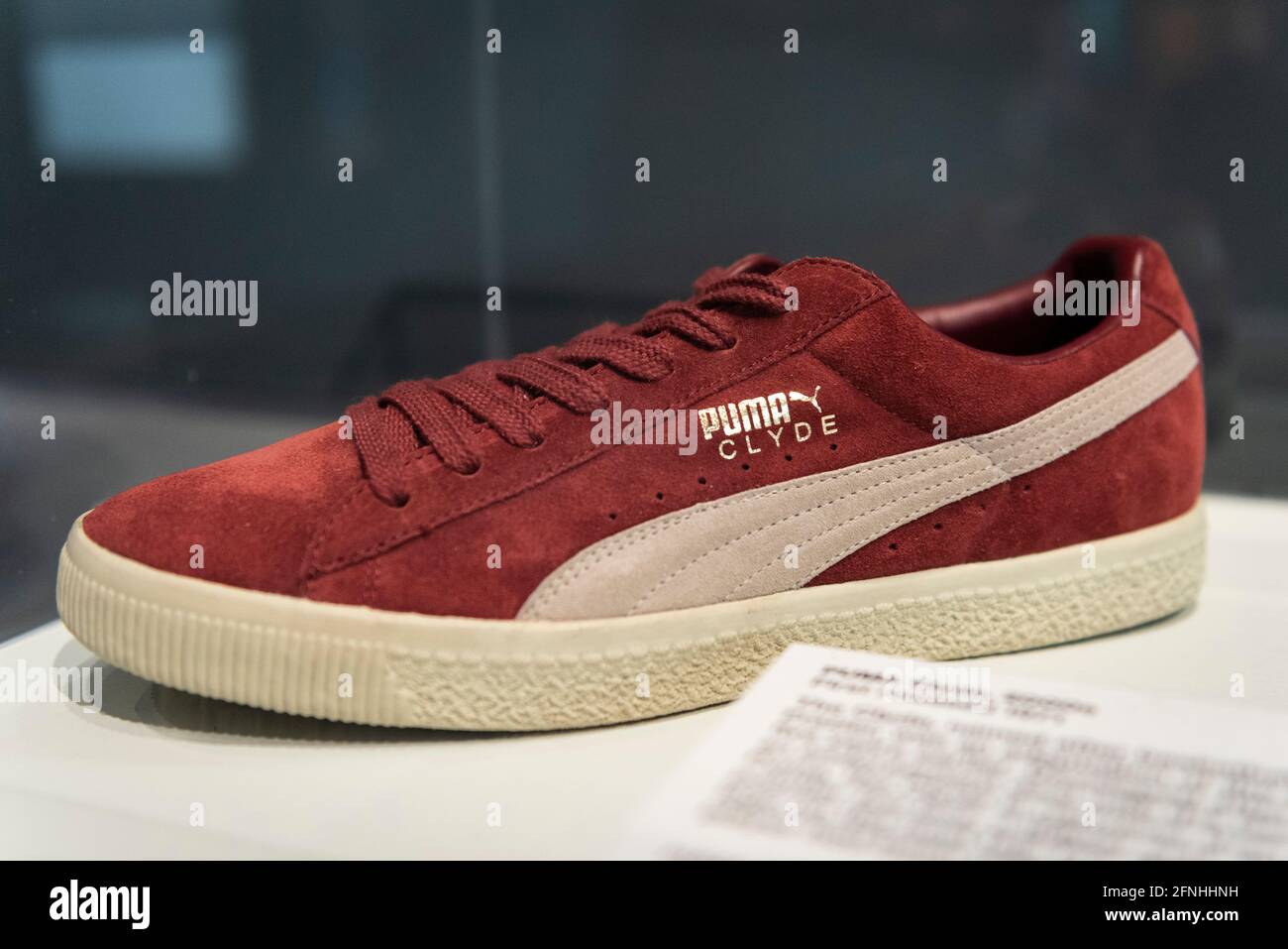 London, UK. 17 May 2021. "Puma Clyde", 2000s, first released 1971. Named  after Walt "Clyde" Frazier, the first basketball player to be paid to wear  a specific shoe. Preview of “Sneakers Unboxed: