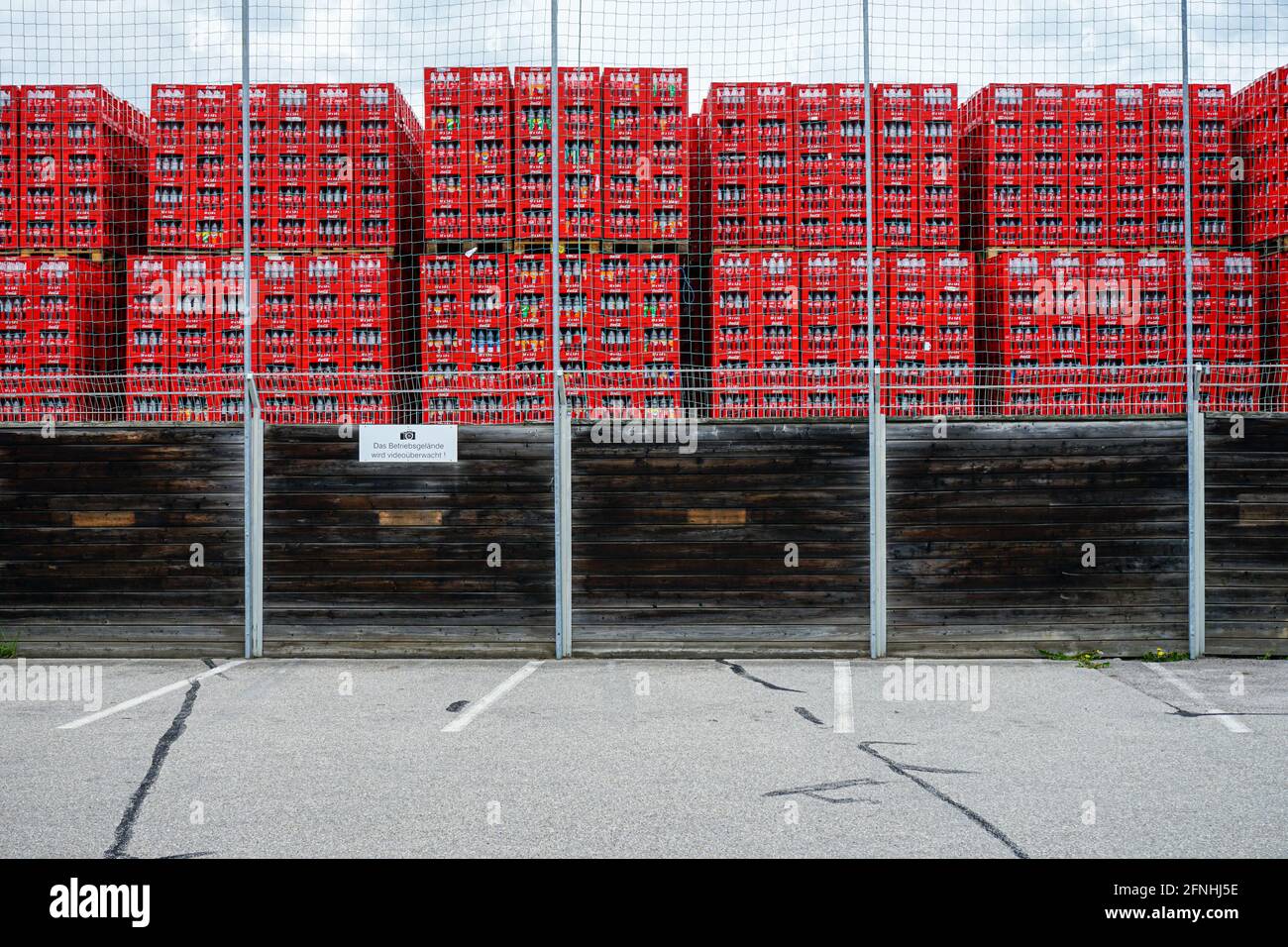 View of the storage areas for crates of empty bottles of the Coca-Cola Company in Buchenau, a district of the city of Fürstenfeldbruck. Stock Photo