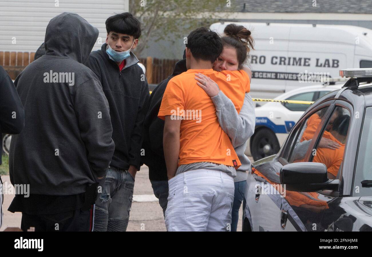 Nubia Marquez, right, is comforted by other family members near the