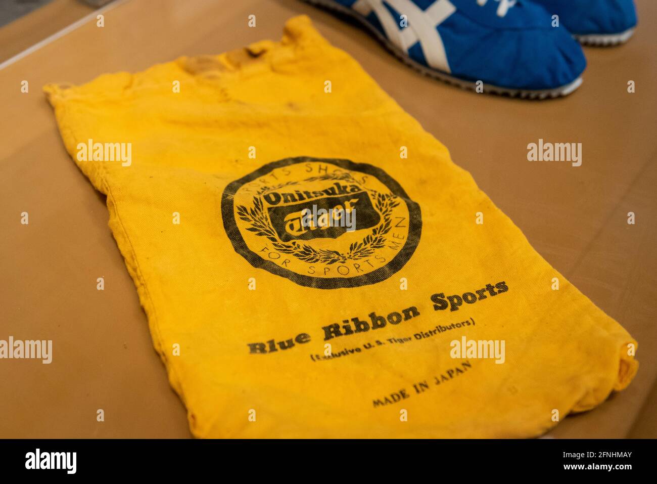 London, UK. 17 May 2021. Onitsuka Tiger shoe bag. Phil Knight and Bill  Bowerman, through Blue Ribbon Sports, distributed Onitsuka Tiger in the US.  When the deal ended, Blue Ribbon Sports became