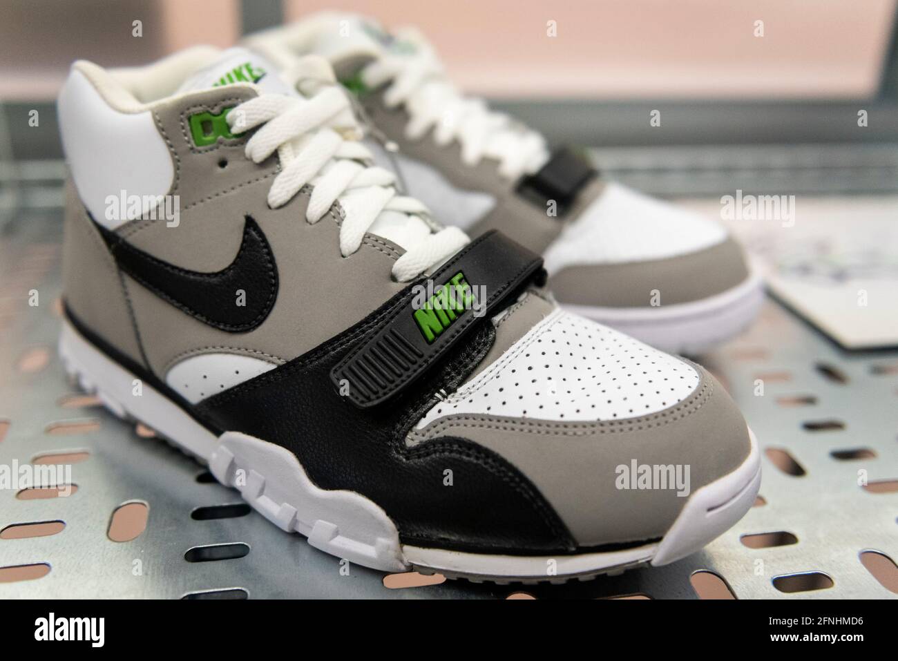 London, UK. 17 May 2021. "Nike Air Trainer, Chlorophyll", 2012, first  released 1987 and the first multi-purpose 'cross-trainer', debuted by John  McEnroe in 1986. Preview of “Sneakers Unboxed: Studio to Street” at
