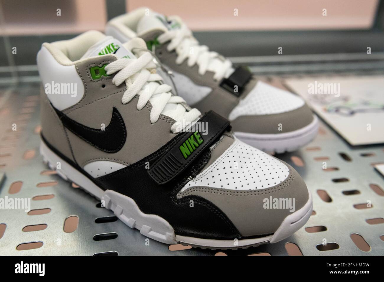 London, UK. 17 May 2021. "Nike Air Trainer, Chlorophyll", 2012, first  released 1987 and the first multi-purpose 'cross-trainer', debuted by John  McEnroe in 1986. Preview of “Sneakers Unboxed: Studio to Street” at