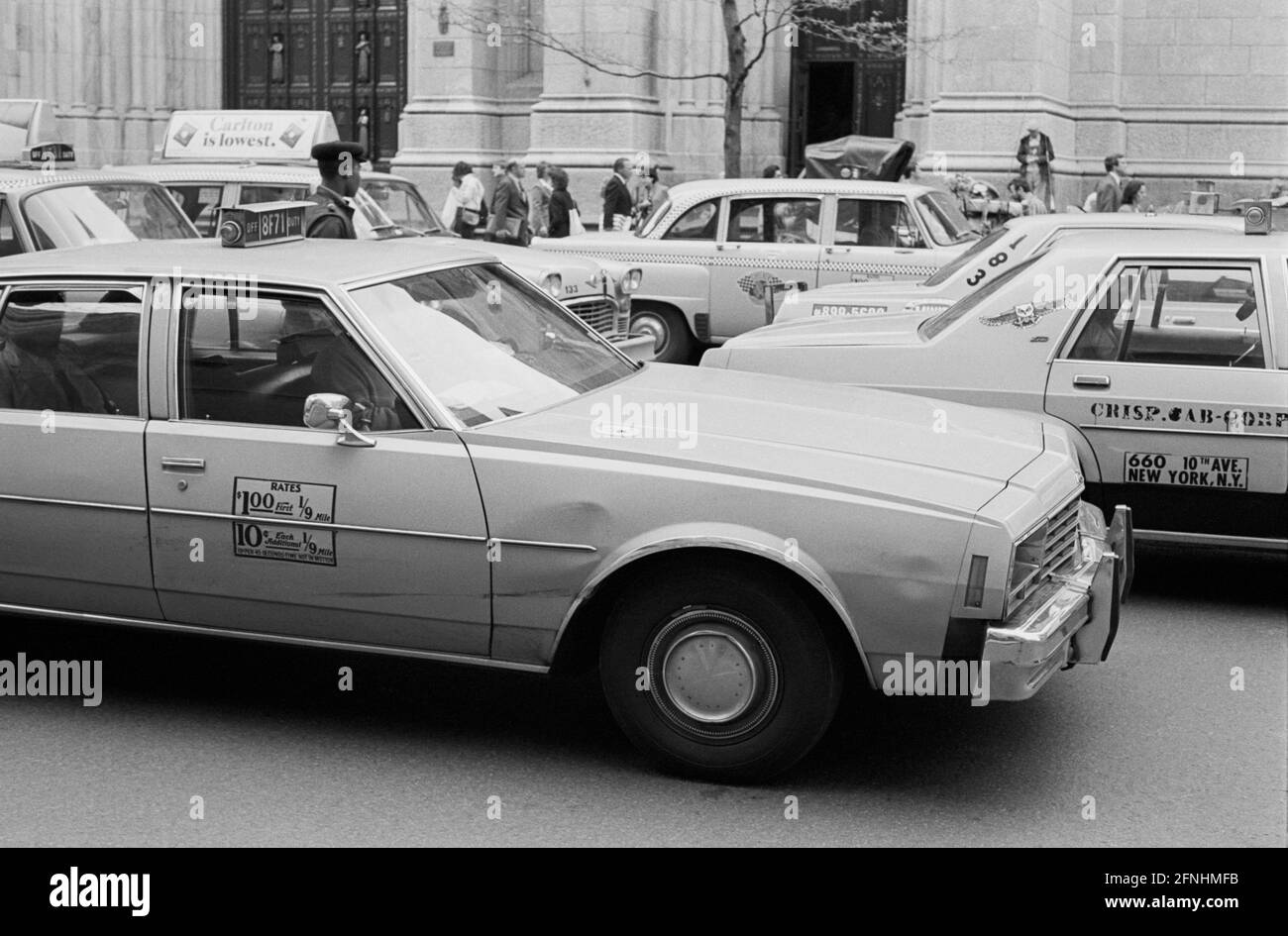 New York City Photo Essay, April 30, 1981- Yellow cabs jam 5th Avenue. St. Patrick's Cathedral in the background. Stock Photo