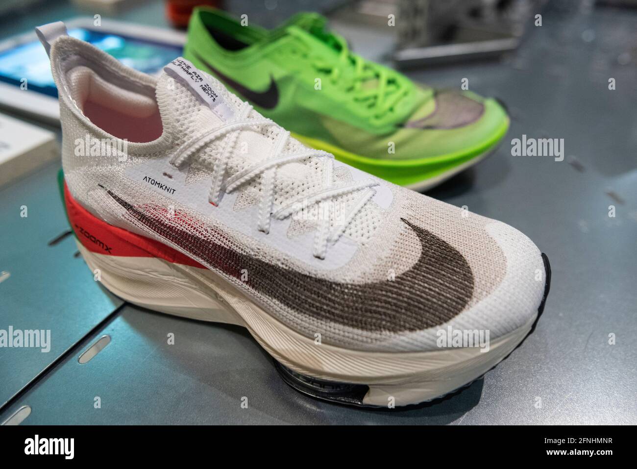 London, UK. 17 May 2021. "Nike Air Zoom Alphafly NEXT%", 2020, and "Nike  ZoomX Vaporfly NEXT%", 2019. Eliud Kipchoge wore prototype Alphafly to run  a marathon distance in under two hours. Preview