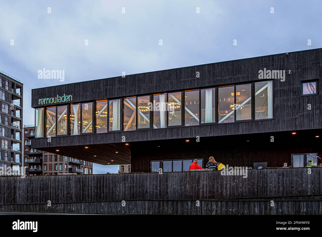 people sittting in front of the gourmet restaurant Remouladen in Vejle, Denmark, May 12, 2021 Stock Photo