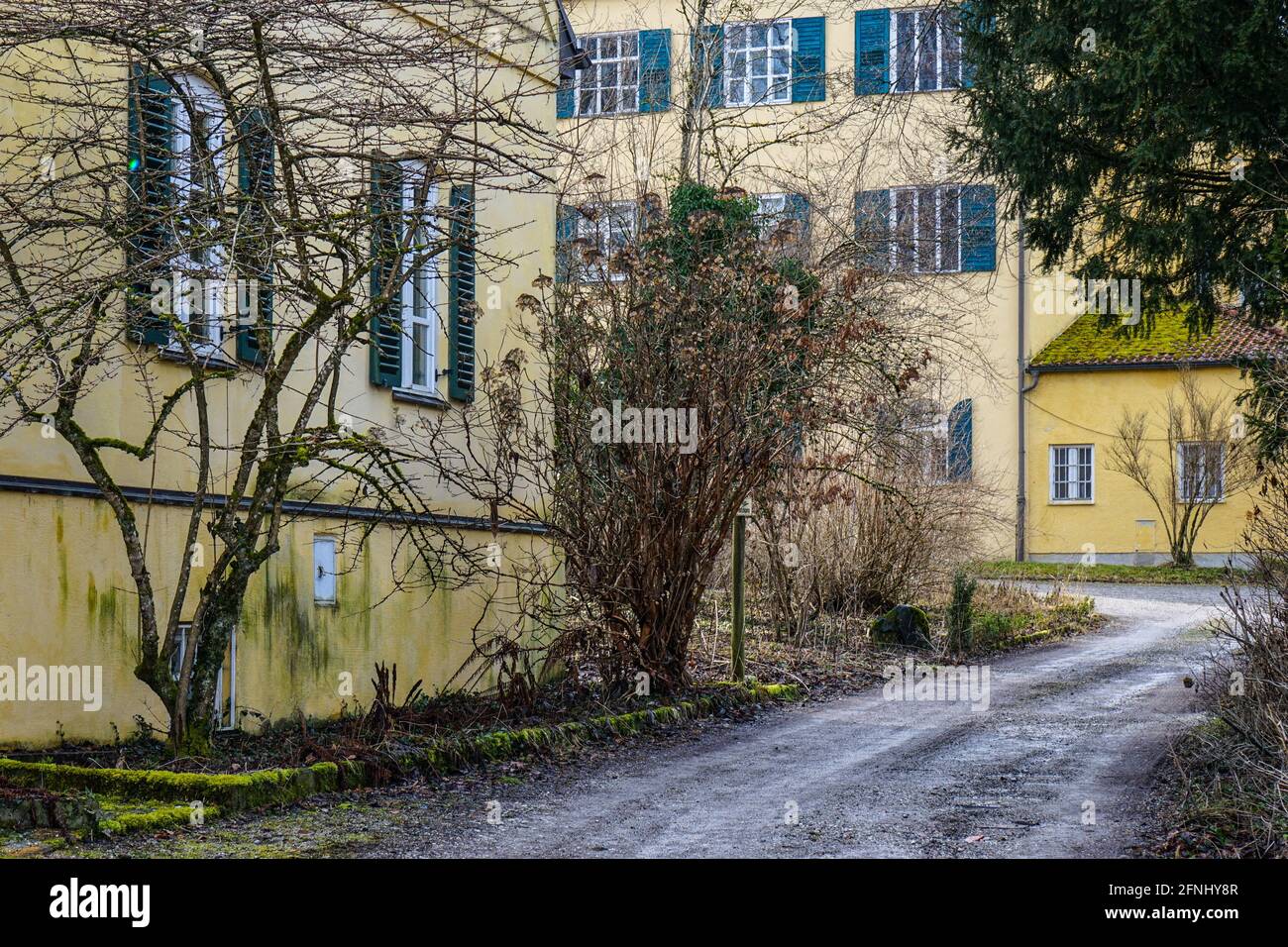 View from the street at Leutstetten Palace has only been in the possession of the Wittelsbach family since 1875. Stock Photo