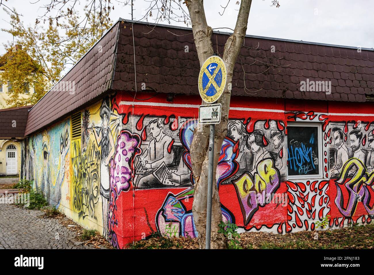 The railway station in the Bavarian town of Weßling in the district of Starnberg. Walls of the station and the outbuildings are covered with graffiti. Stock Photo