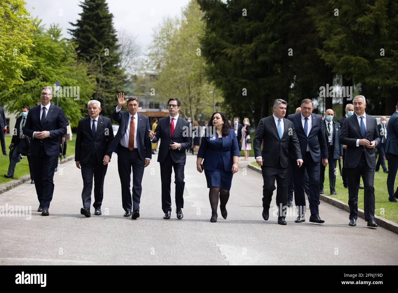 Kranj, Slovenia. 13th May, 2020. Chiefs of state take a walk during the Brdo-Brijuni Process summit. Slovenian president Borut Pahor hosted a summit of the Brdo-Brijuni Process in Brdo pri Kranju where he met the presidents of Albania, Croatia, Serbia, North Macedonia, Montenegro, Kosovo and the presiding trio of Bosnia and Herzegovina, marking the 10th anniversary of the initiative. Credit: SOPA Images Limited/Alamy Live News Stock Photo