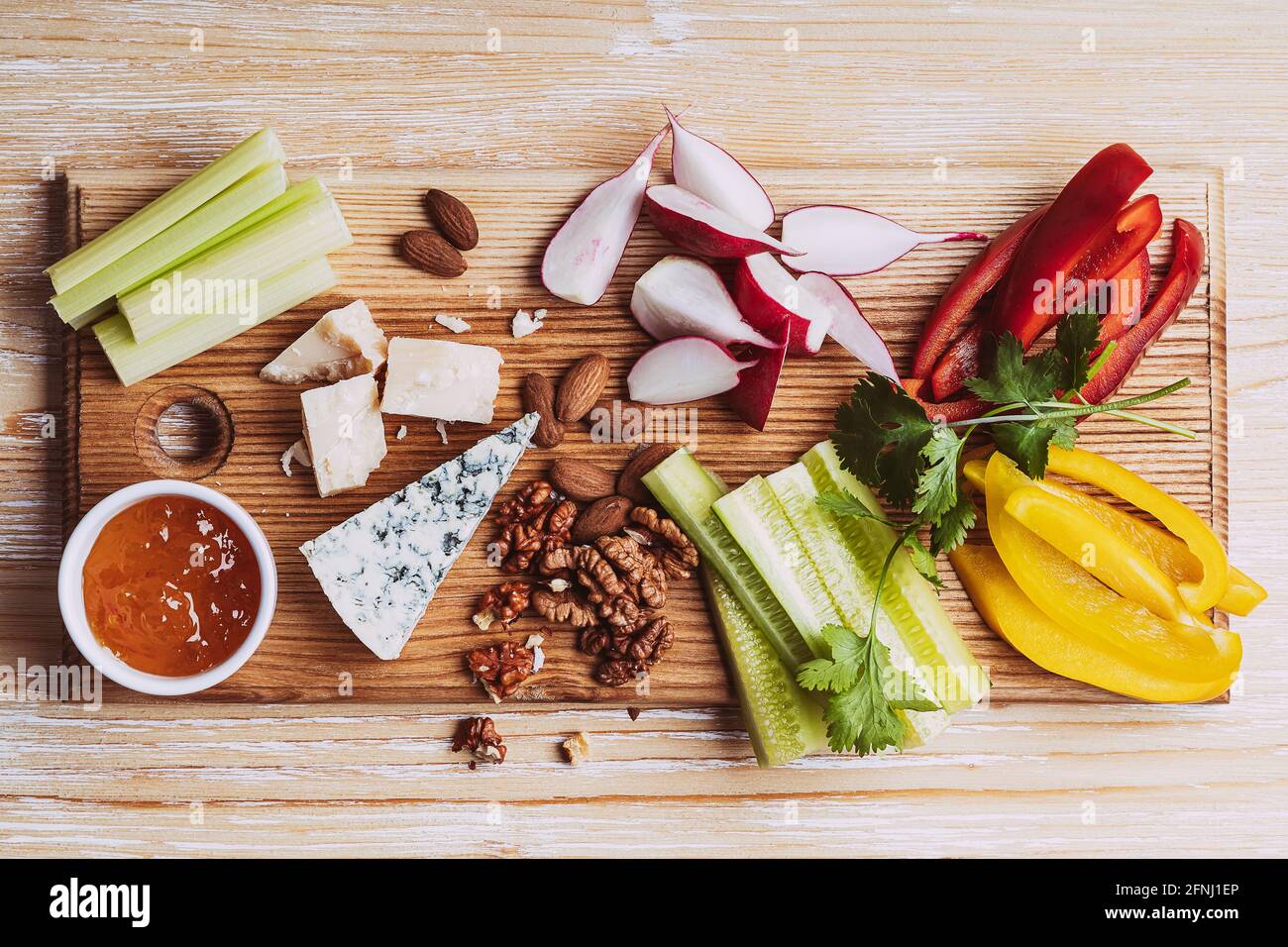 Keto diet snack platter with vegetables and cheese, cheese board