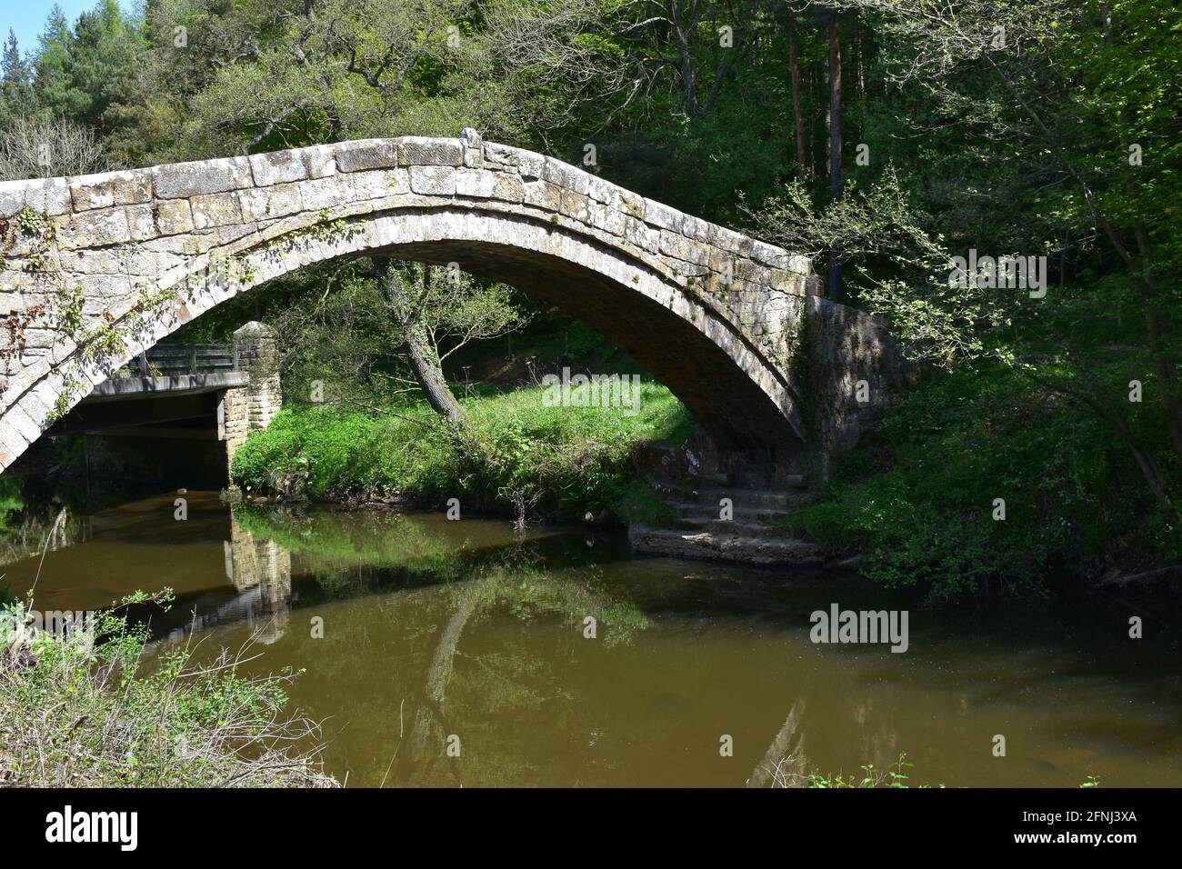 Stunning historic beggar's bridge over the river esk in Yorkshire ...