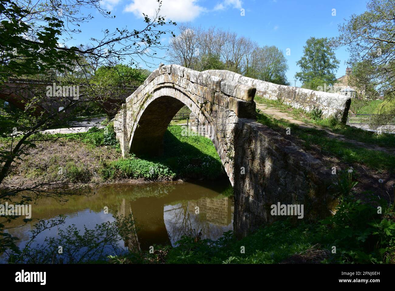 Historic look at Beggar's Bridge over the River Esk Stock Photo - Alamy