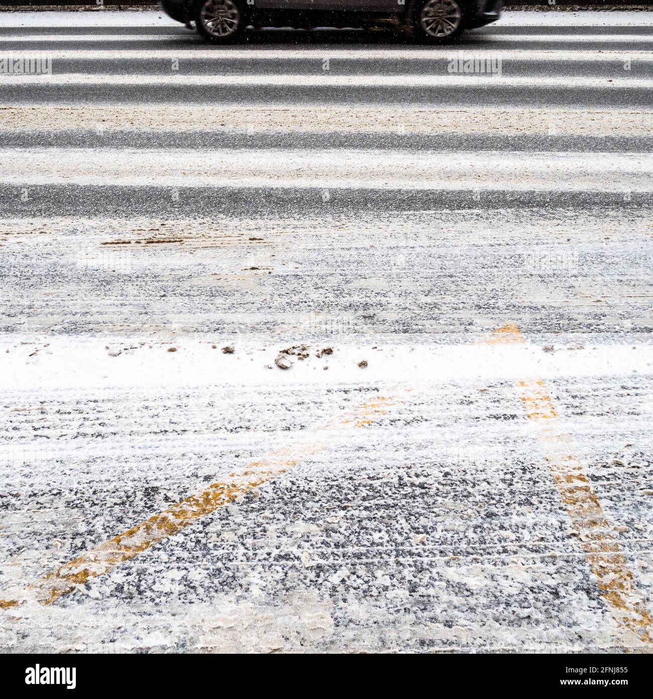 slippery uncleared surface of multilane road after snowfall on winter day Stock Photo