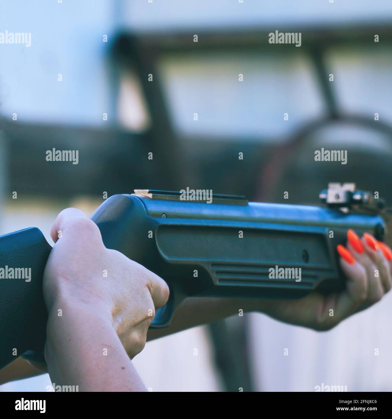 Girl with hunting rifle hi-res stock photography and images - Alamy