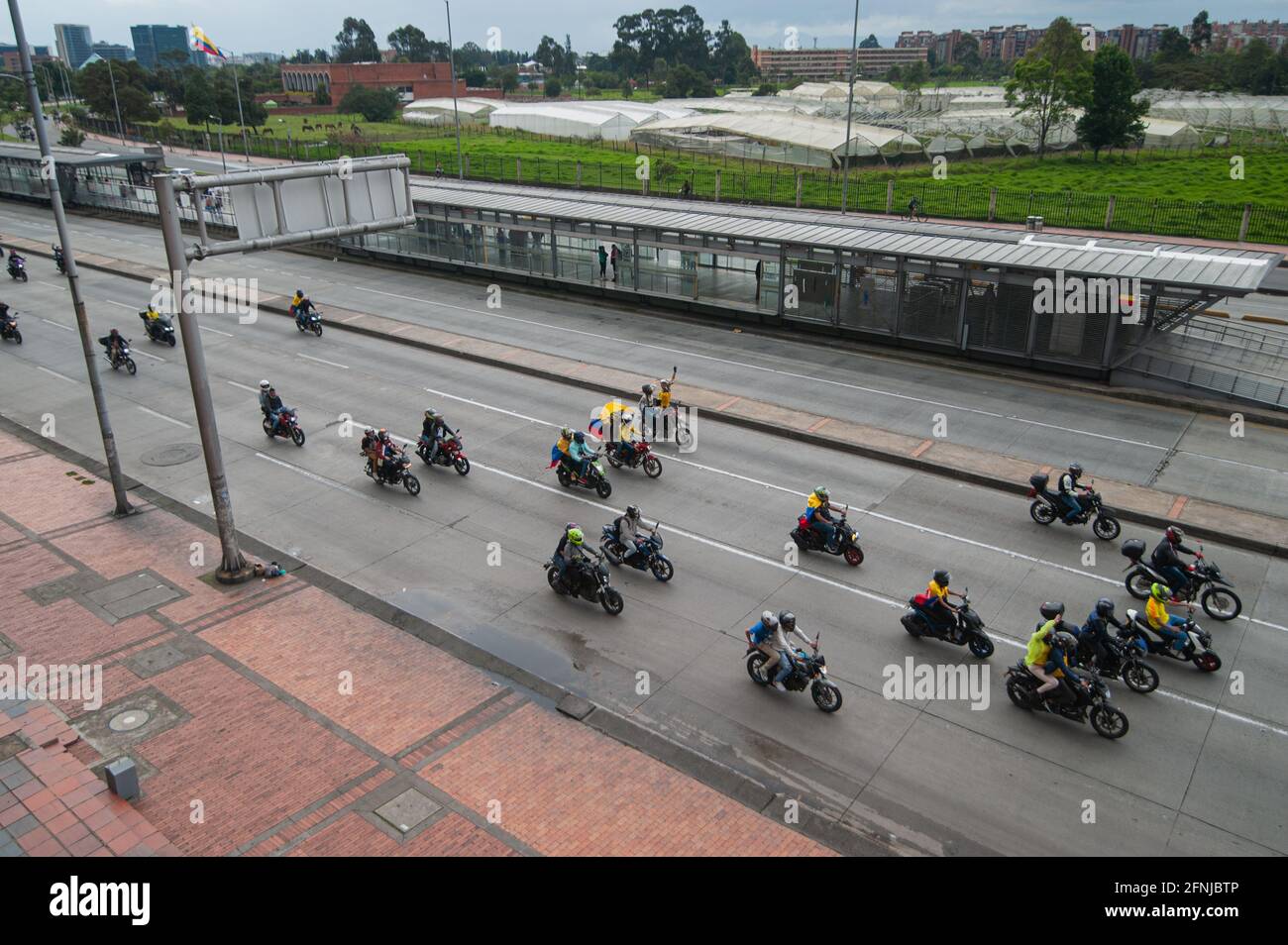 Bikers with Colombian Flags, flood streets of Bogota to celebrate the withdraw of the tax reform of President Ivan Duque, in Bogota, Colombia on May 2, 2021. Stock Photo