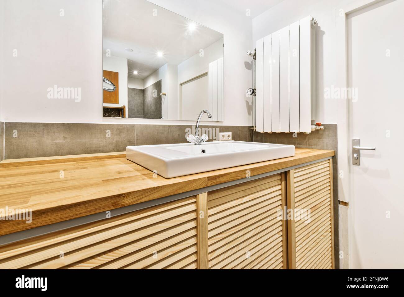 Cupboard with sink in bathroom Stock Photo Alamy