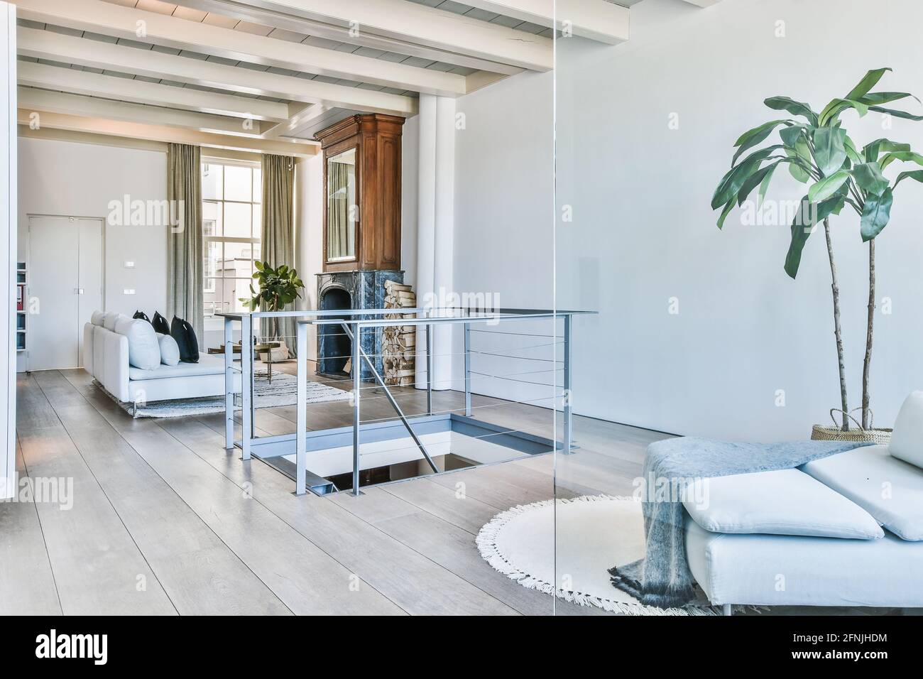 Spacious living room with chaise lounge Stock Photo Alamy