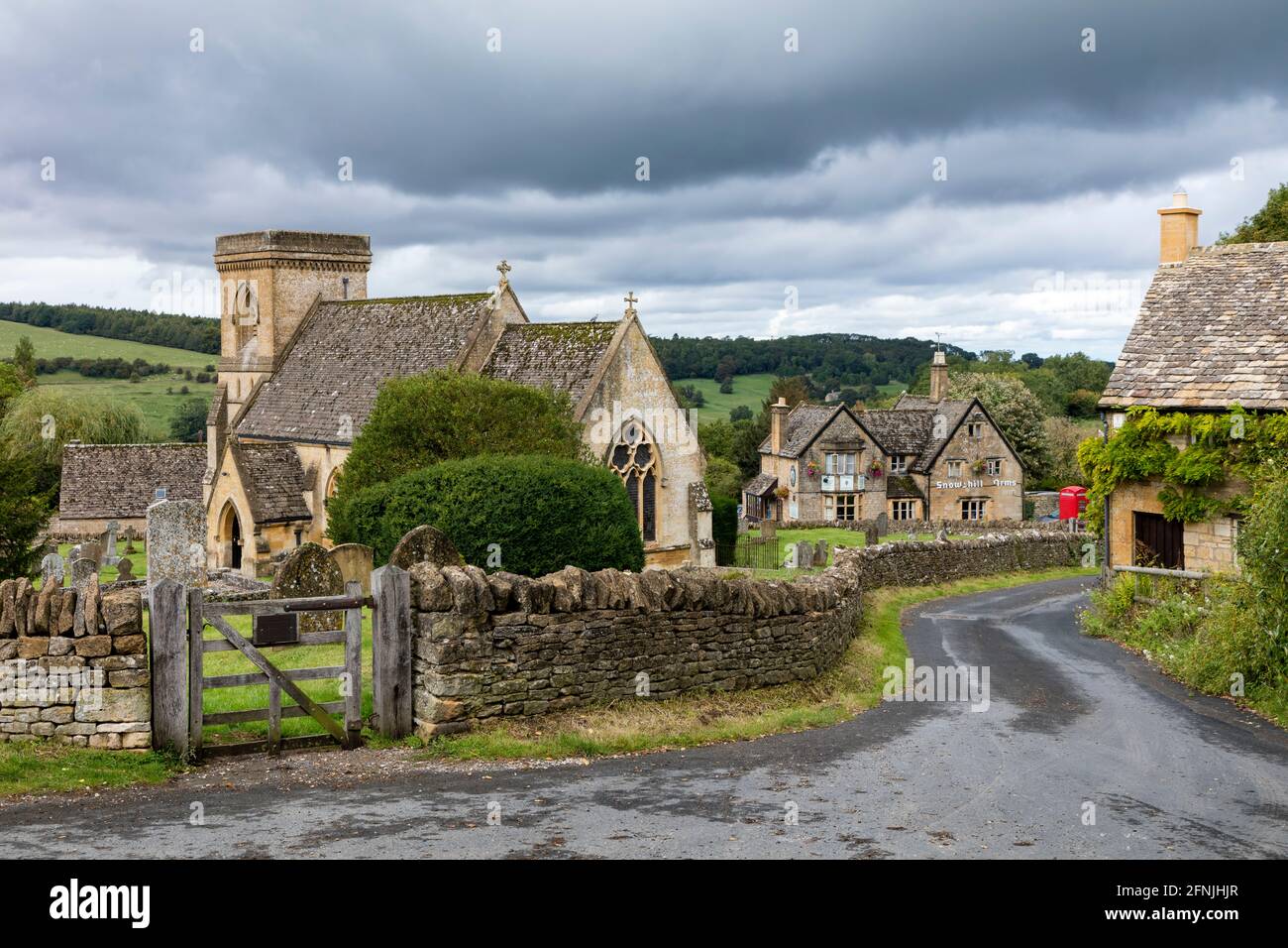 Saint Barnabas Church and Cotswolds town of Snowshill, Gloucestershire, England, UK Stock Photo