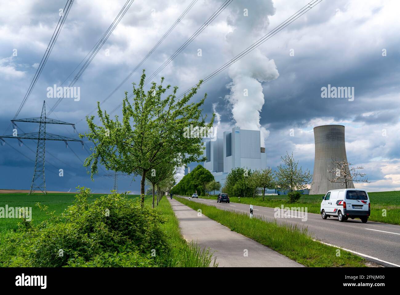 Neurath lignite-fired power plant, near Grevenbroich, RWE Power AG, Rhenish lignite mining area, storm clouds, energy route, NRW, Germany, Stock Photo