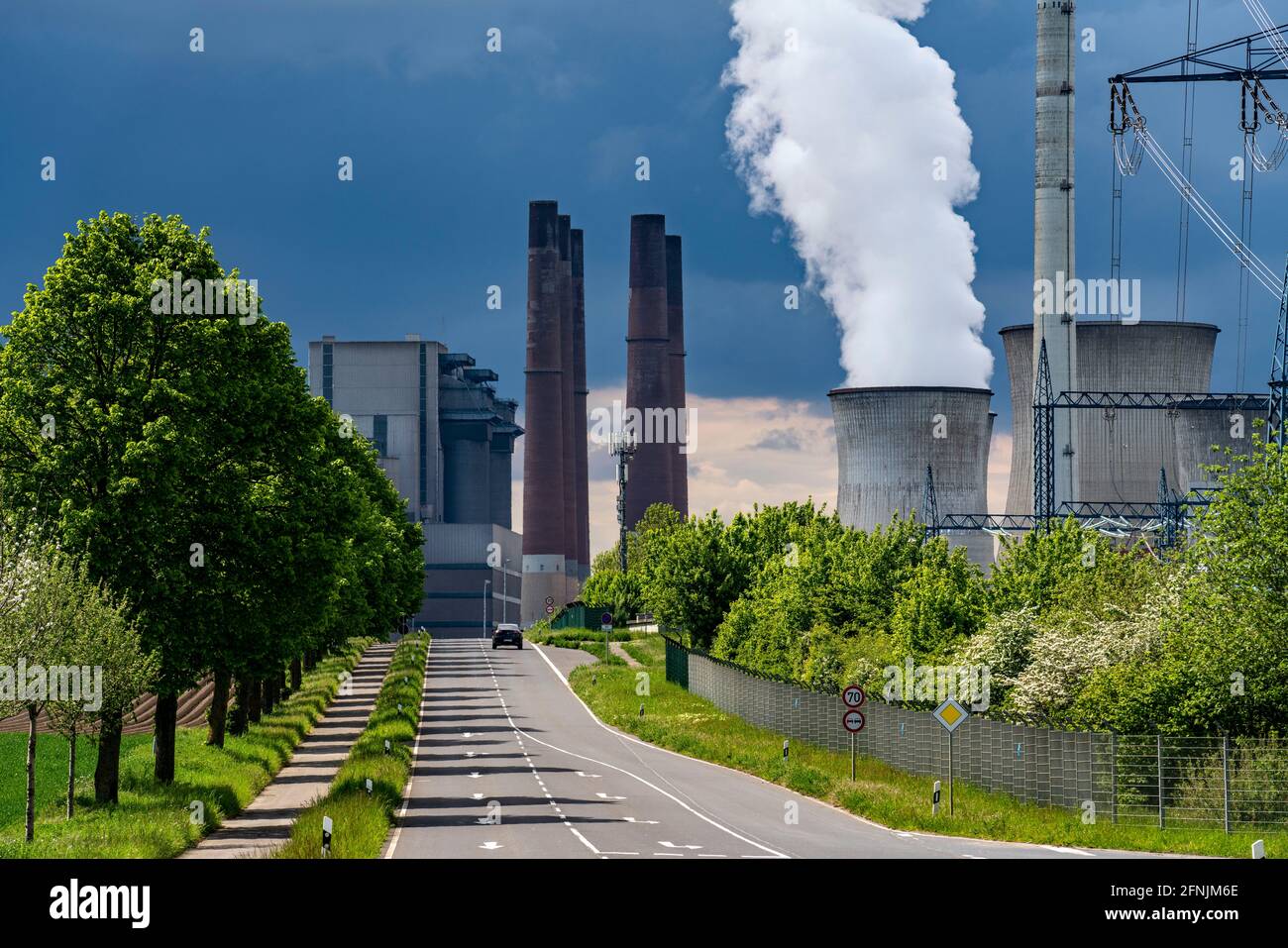 Neurath lignite-fired power plant, near Grevenbroich, RWE Power AG, Rhenish lignite mining area, storm clouds, energy route, NRW, Germany, Stock Photo