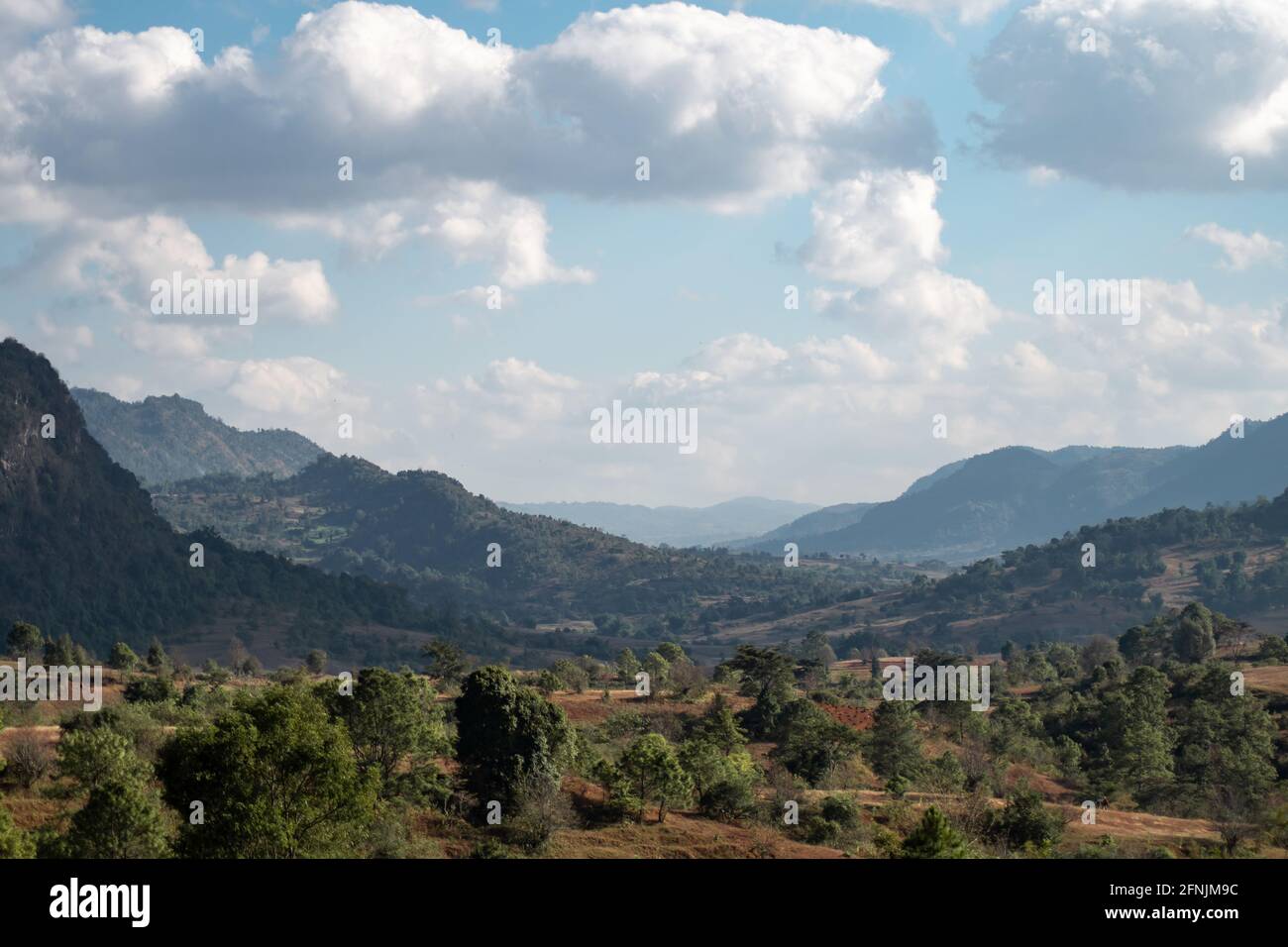 Beautiful valley landscape between hills and mountains between Kalaw and Inle Lake, Shan state, Myanmar Stock Photo