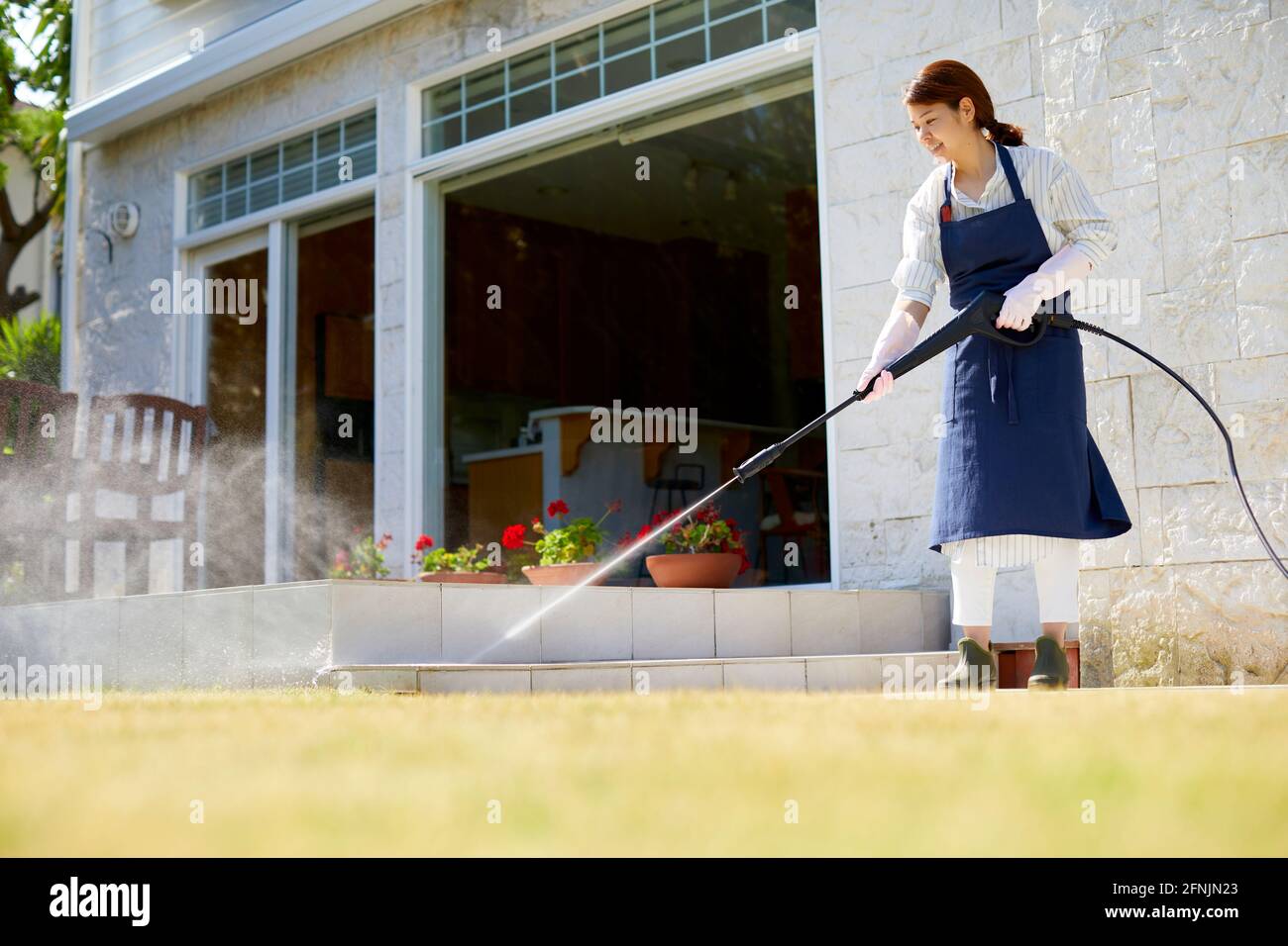 Japanese woman cleaning the house Stock Photo Alamy