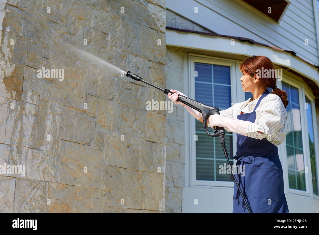 Japanese woman cleaning the house Stock Photo Alamy