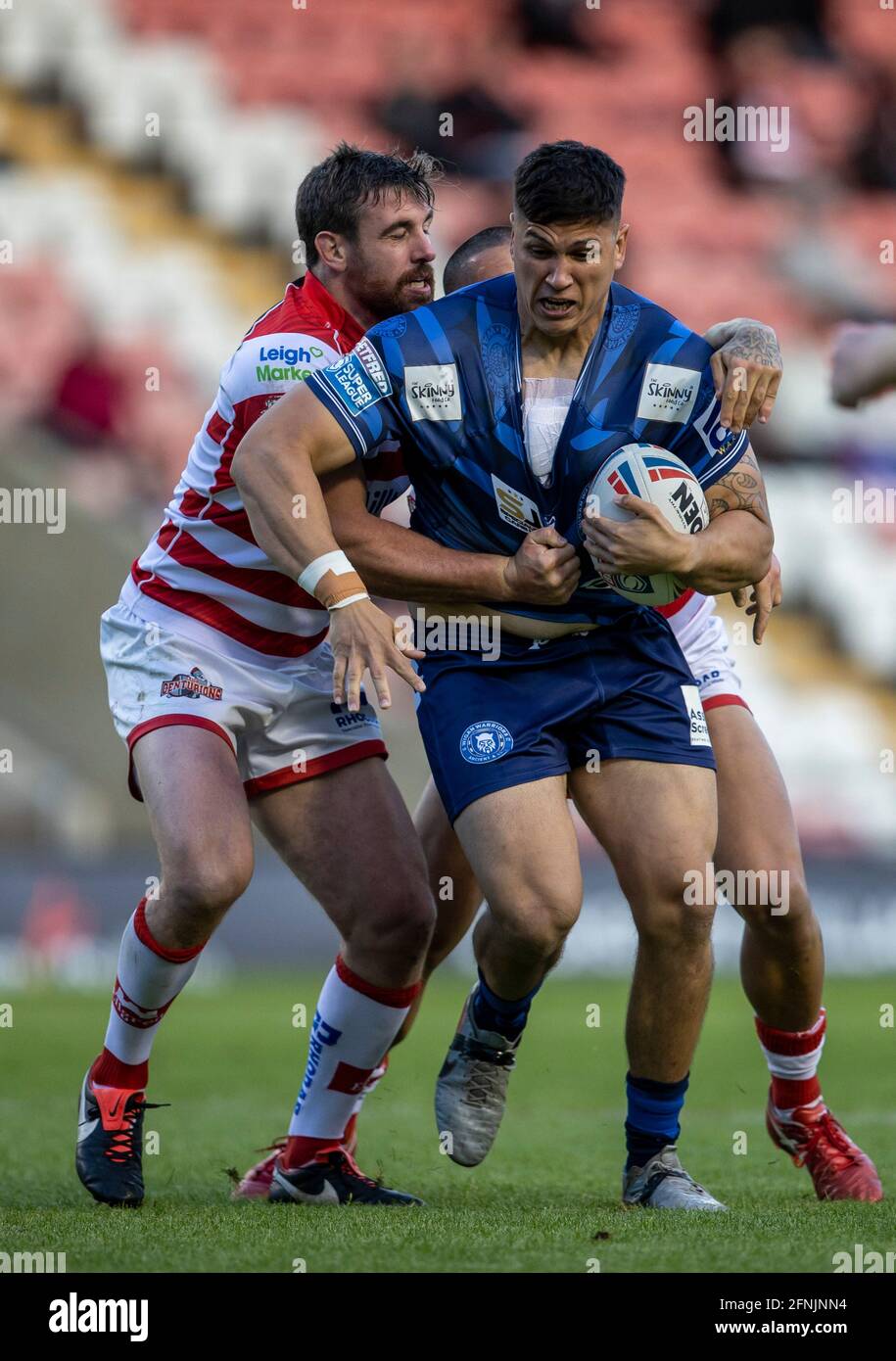 Leigh Sports Village, Lancashire, UK. 17th May, 2021. English Rugby League;  Leigh Centurions versus Wigan Warriors; Mitch Clark of Wigan Warriors is  tackled Credit: Action Plus Sports/Alamy Live News Stock Photo -