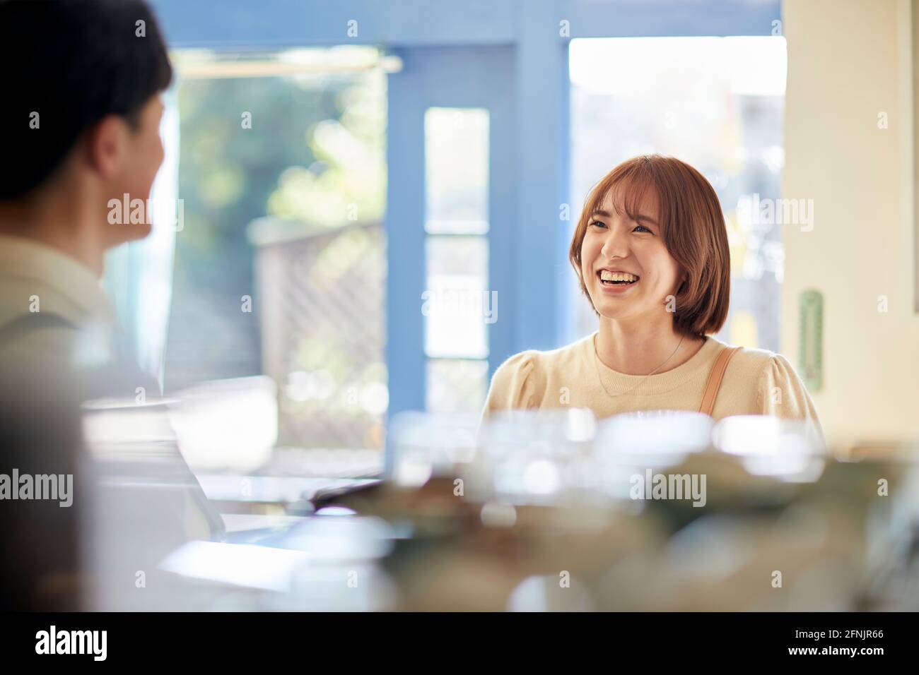 Young Japanese woman at a cafe Stock Photo - Alamy