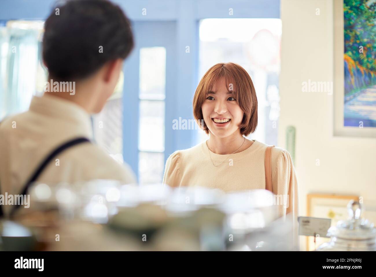 Young Japanese woman at a cafe Stock Photo - Alamy