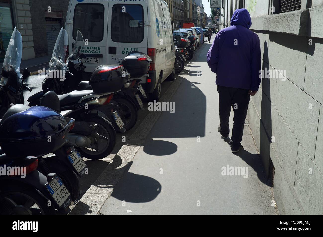 Man in the hood hi-res stock photography and images - Alamy
