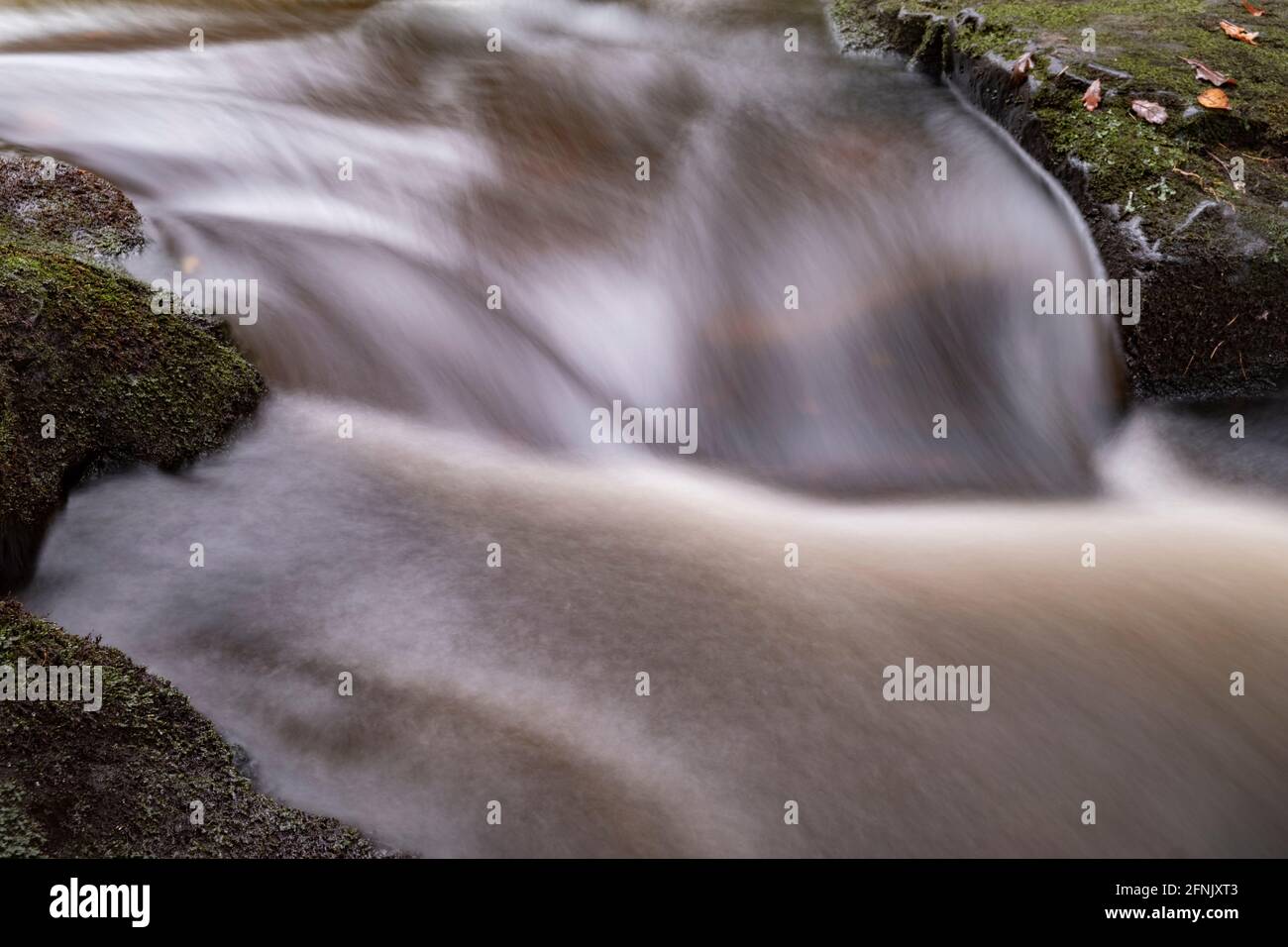 A small waterfall abstract on the North York Moors Stock Photo