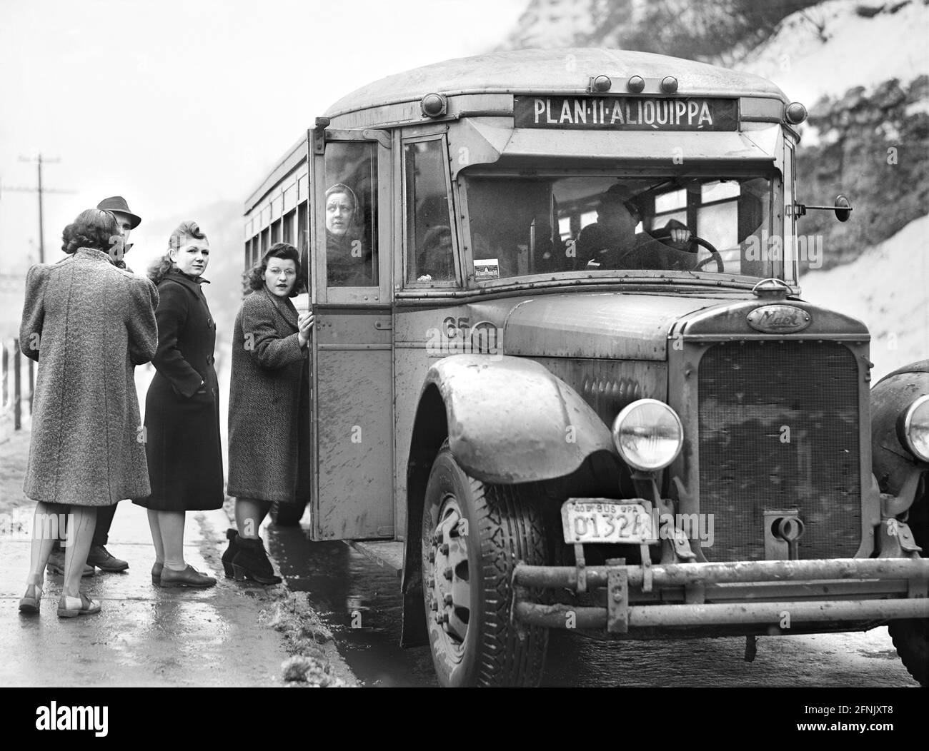 Young Women boarding Bus to go home at end of Workday, Jones and Laughlin  Steel Corporation, Aliquippa, Pennsylvania, USA, Jack Delano, U.S. Office  of War Information, January 1941 Stock Photo - Alamy
