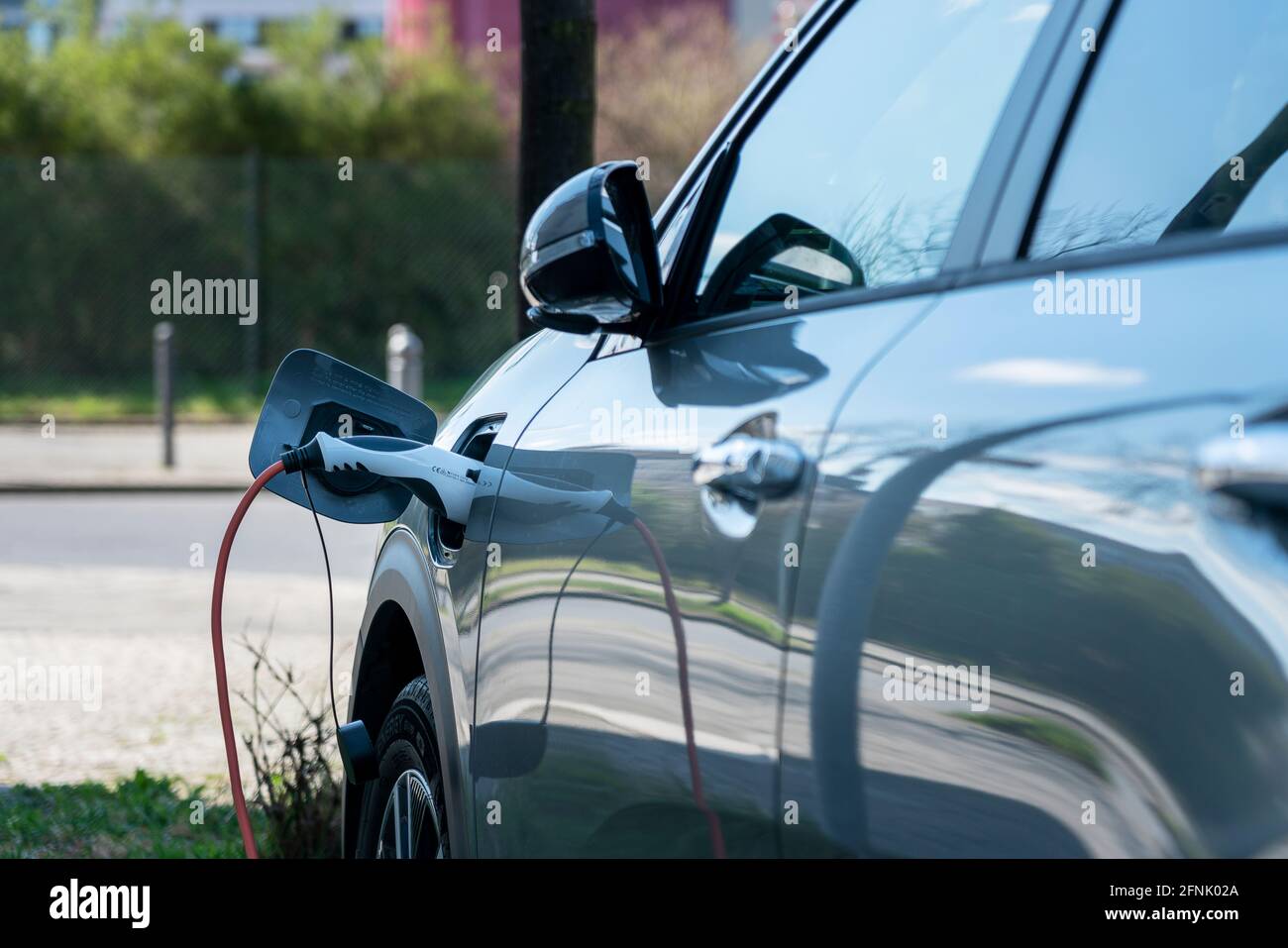 Charging Cable On An Electric Car Stock Photo Alamy