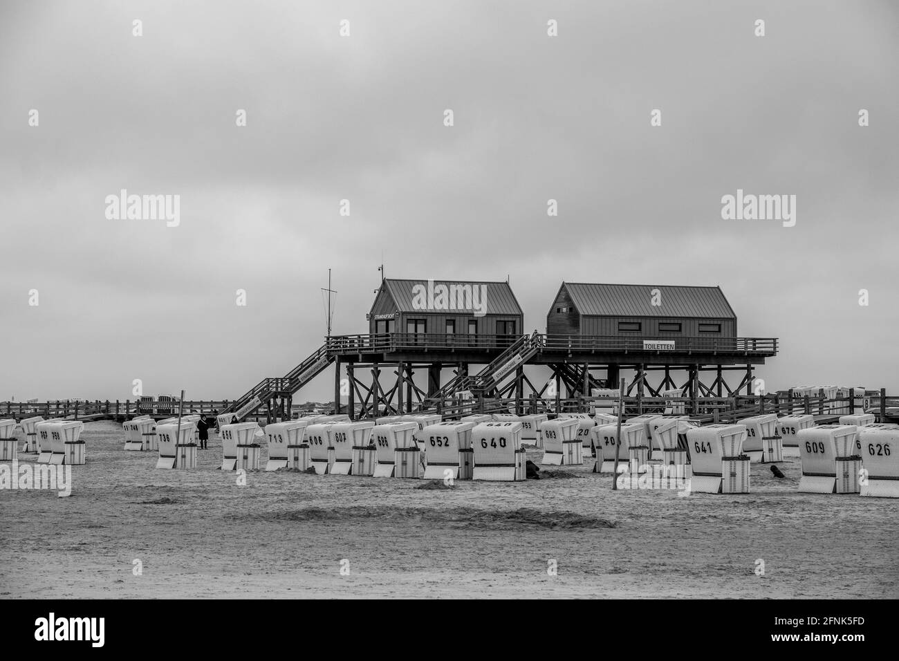 House on Stilts on the coast near Sankt Peter Ording Stock Photo